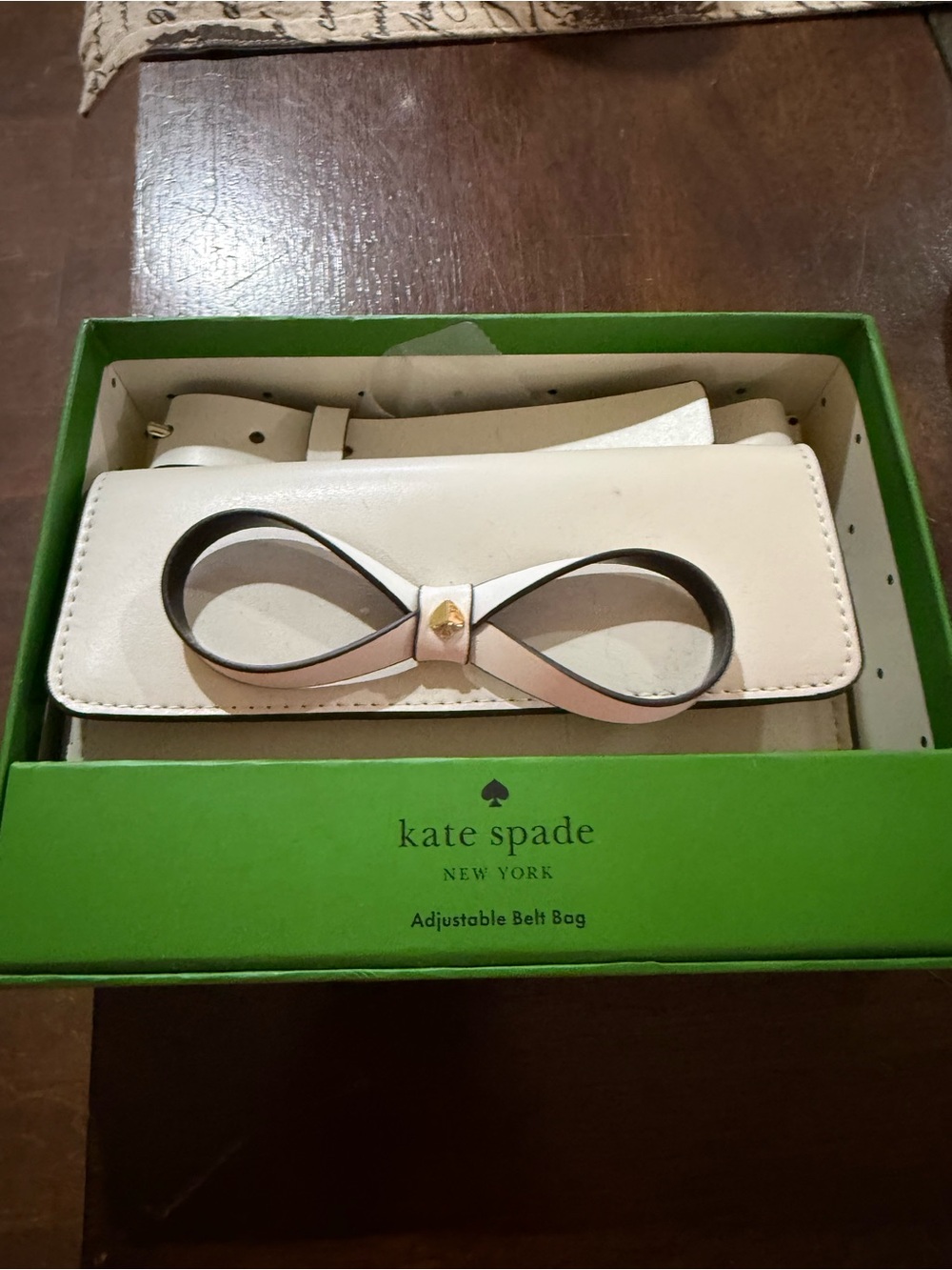 kate spade cream and black bow belt bag